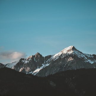 Mountain Landscapes - Stunning view of snow-capped mountains against a #1054218