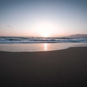 Beach Scenery - Beautiful sunset over a tranquil beach with gent #13335454