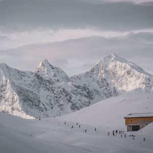 Snow Mountains - Breathtaking snow-covered peaks and cabin in War #14899422