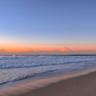 Beach Scenery - Peaceful beach scene at sunrise with gentle wave #16354140