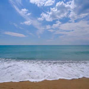 Beach Scenery - Relaxing view of a sandy beach with calm turquoi #17828913