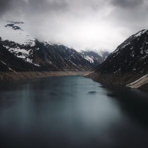 Lake Reflections - Breathtaking view of a serene lake surrounded by #19161533