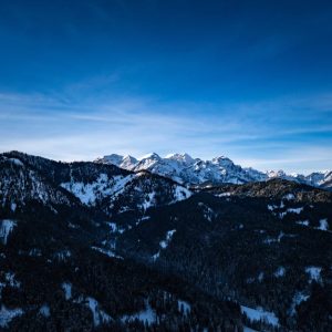 Mountain Landscapes - A stunning view of snow-covered mountain peaks u #19868383