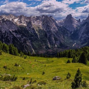 Mountain Landscapes - Scenic view of mountains and lush valley under a #29265549
