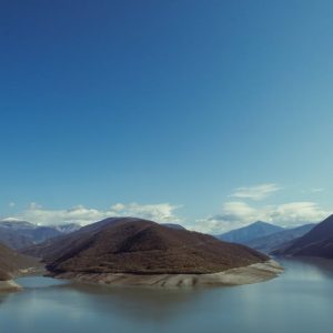 Lake Reflections - Peaceful landscape of Ananuri reservoir and moun #31895783
