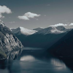 Mountain Landscapes - Beautiful view of a Norwegian fjord surrounded b #32574837