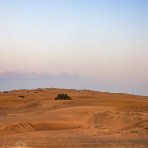 Desert Wilderness - A scenic view of a desert landscape at sunset wi #35112813