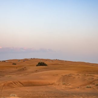 Desert Wilderness - A scenic view of a desert landscape at sunset wi #35112813