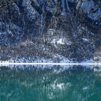 Lake Reflections - Serene winter landscape with snow-laden mountain #35352506