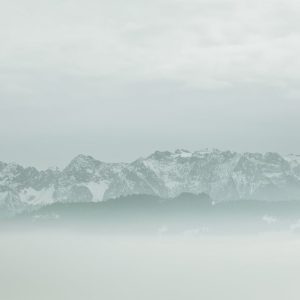 Snow Mountains - Captivating snowy mountain range shrouded in mis #35898949