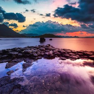 Lake Reflections - A breathtaking view of a sunset reflecting over  #4700630