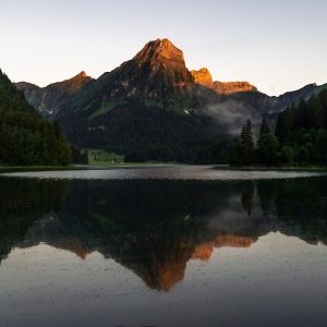 Lake Reflections - Stunning view of a mountain mirrored in a calm l #4800408